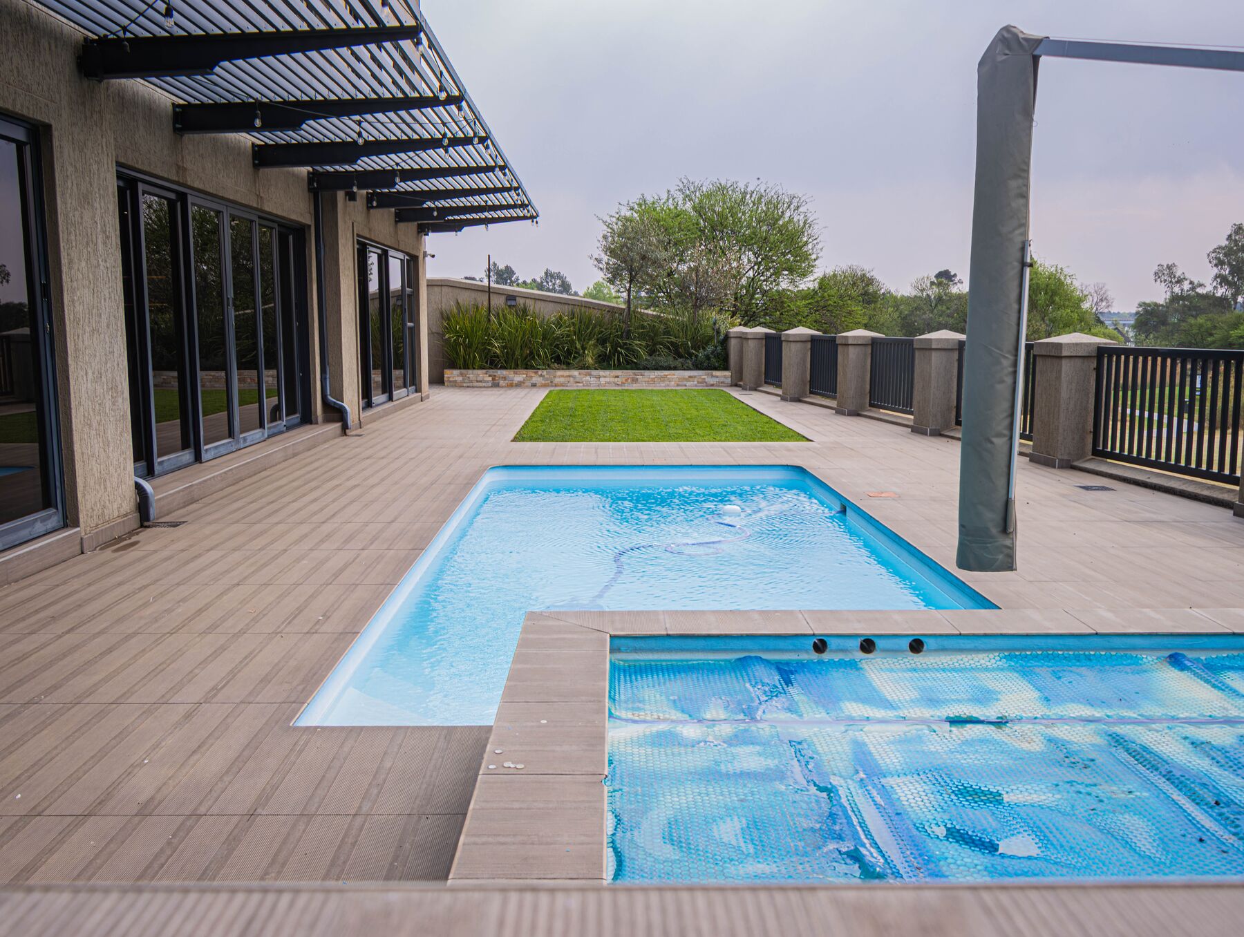 Private pool and jacuzzi at a Heron Banks home
